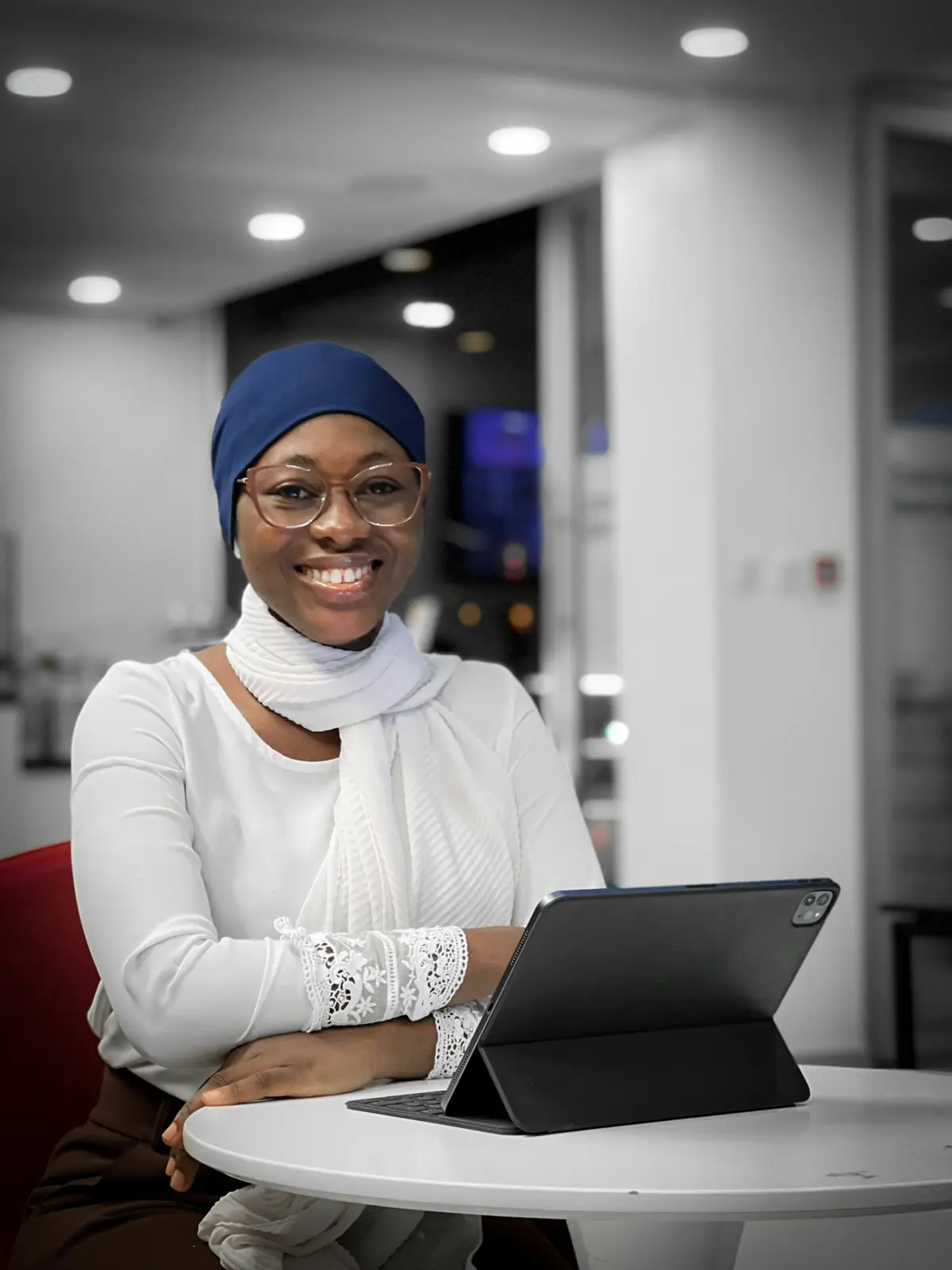 An HR professional in conversation with a colleague